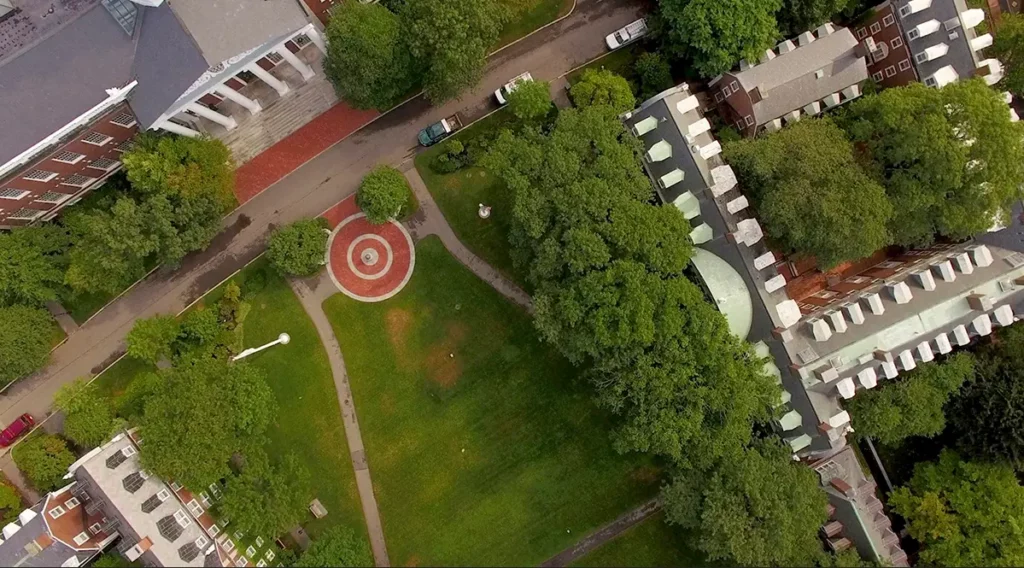 An aerial view of a college campus inspires.